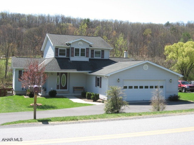 Immaculate home on a beautiful .59 acre setting. Many upgrades including new kitchen with quartz countertops, oak interior doors & trim. Also features a 1st floor master bedroom, 2 car garage, C/A & fenced yard.