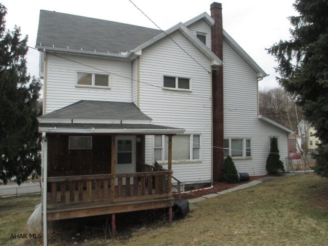 Check out the lot and location. Four city lots makes a great yard for all of your needs. Very roomy house with newer roof, electrical upgrades, new water line, fully insulated, and more. Large kitchen with lots of counter space and room for a dining table, but there is also a formal dining room. Covered porch works well for outdoor dining and relaxing. Open concept from sun room to living room to dining room. Nice size modern shed. This is not just a starter home but a lifetime home. Hard to find a place like this at this price.
