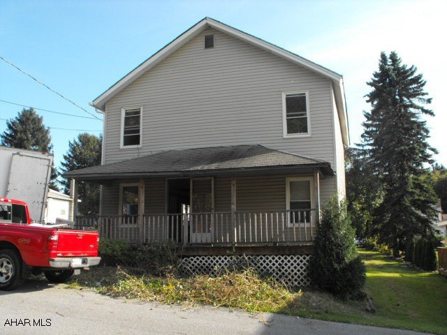 Handyman Special.  Coal hot water heat.  Waterline easement thru back yard.