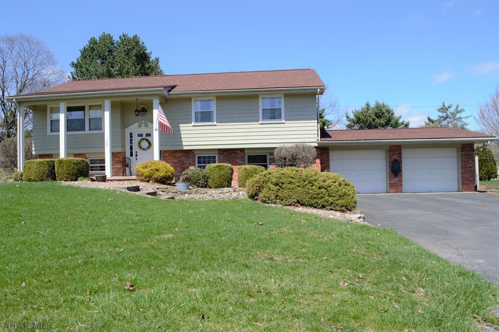 Light, Bright, Airy, & Chic!  This 3 BR home in Penn Farms has lots of space in the basement, including room for a 4th BR if needed.  Hardwood floors throughout much of the upstairs, and the open dining/living room is sure to please.  The kitchen is updated with SS appliances, and the Master BR has double closets as well as its own 3/4 bath.  The back porch offers an enclosed area perfect for relaxing, as well as an open area to enjoy summer grilling & entertaining on it or in the large yard.  The basement has plenty of options-with a lower level living room, family room (with gas fireplace) and an exercise/game room with built in shelving.  As if this isn't enough, there is a half bath downstairs, as well as a big laundry room & plenty of addl storage. 2 car Att Garage, C/A, Roof (2011).