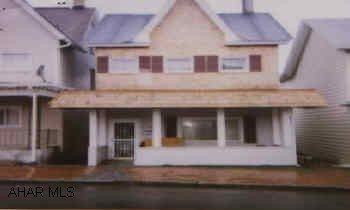 MUST SEE INSIDE. SOME REMODELING DONE. SOME STILL NEEDED. FIREPLACE IN DINING ROOM.