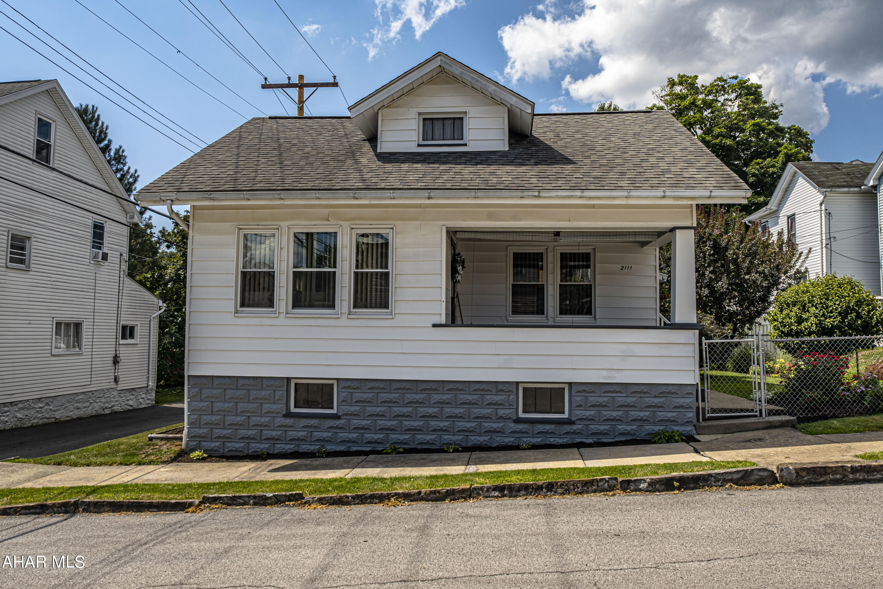Meticulously maintained and freshly painted, single-level home. Beautifully landscaped, small fenced-in yard. Large living room with French doors leading to dining room. Kitchen and bath have updated plank flooring. Large walk-up attic has plenty of storage. Beautiful original woodwork and charm throughout. Large windows letting in lots of natural light. Well insulated and low maintenance living in close proximity to PSU Altoona Campus, UPMC, and shopping. Check out our 3D virtual tour!