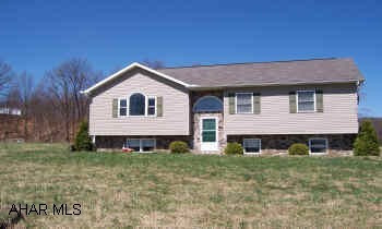 sold as is.See listing agent for addendum .Located on  Rt 550 from Tyrone towards Warrior's Mark.  Nice bilevel on 3.35 acres.