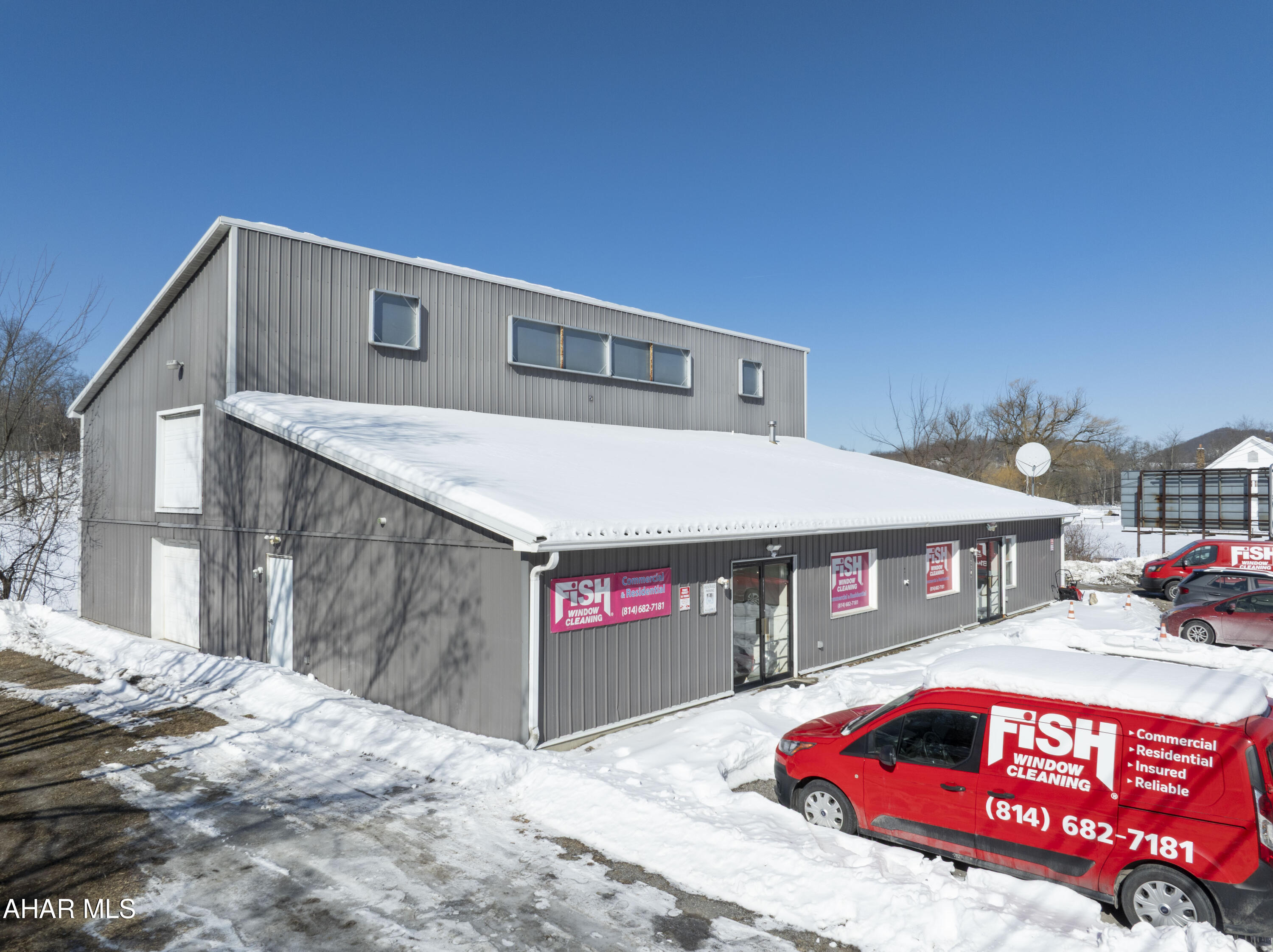 Commercial property on East Pleasant Valley Blvd in Bellwood with income in place. The front portion is currently leased through December 2028, providing immediate cash flow. The rear garage/warehouse space and entire second floor are vacant and ready for owner use or additional rental income (see floor plans in listing photos). The warehouse portion includes two roll-up doors (8' and 14') and is well suited for storage, contractor use, or light industrial operations. The property offers parking for approximately 12-15 vehicles, washer and dryer hookups, a small kitchenette with refrigerator, and numerous built-in shelving units. Conveniently located along East Pleasant Valley Blvd with strong road exposure, this property presents a solid opportunity for investors or business owners seeking flexible commercial space with income already in place.