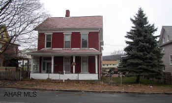 BRICK HOUSE ON DOUBLE FENCED LOT.  COULD EASILY BE DUPLEXED WITH GARAGE AND OFF STREET PARKING. BEING SOLD AS -IS.  PLEASE CONTACT LISTING AGENT FOR ADDITIONAL ADDENDUMS.  HUGE BRICK 2.5 STORY THAT COULD VERY EASILY BE DUPLEXED.  2 CAR GARAGE PLUS OFF STREET PARKING.  FENCED YARD WITH LOTS OF ROOM.  BRING OFFERS!