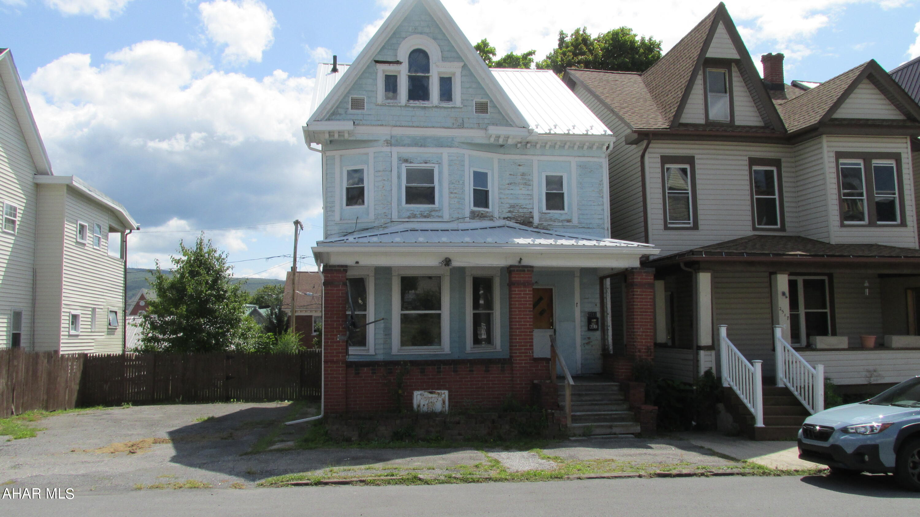 Handyman Special! - 2 story traditional style frame with wood siding, newer metal roof, new hot water tank & gas service line. Property has an assumable VA mortgage at 4.3 interest rate, updated electric throughout & all VA required handrails, GFIC outlets. Needs are mostly cosmetic. A block 20x20 garage, double lot with off street parking.