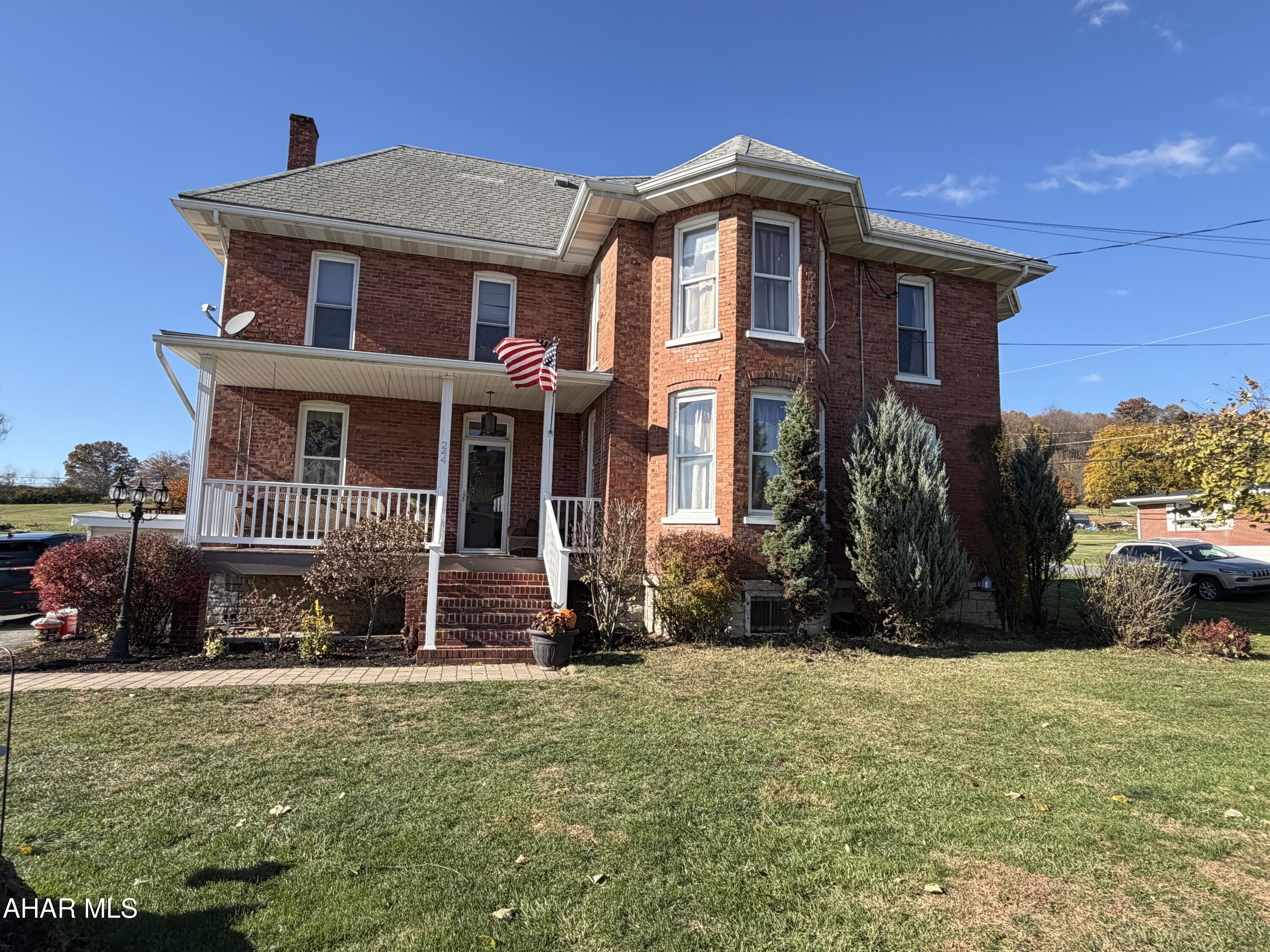 Welcome to the most beautiful Victorian home built in 1892 in Osterburg, PA,  where historic charm meets modern luxury! This home offers 6BR and 2FB. Home has been remodeled however, seller kept the craftsmanship of the woodwork while updating to a more modern home. From the gorgeous cherry kitchen cabinets, to luxury vinyl flooring, ceramic tiled baths inside shower and flooring, you will fall in love with this home. First floor laundry offers convenience along with a full bath, 2BR, LR and DR. Find the large master BR on the second level along with 3BR's and a full bath. Need more space? Not an issue here with the fully finished attic. 
Once you retreat to the outside, enjoy the peacefulness of the outdoor patio with a fireplace. Hear the laughter of kids playing in the yard thats over a half acre! 
And, home features a 2 car detached garage.
(History pertaining to the red glass door -In the 1800s, red glass in a door was a popular decorative choice that indicated status, as the color was often created using expensive ingredients like gold. It was a stylish and eye-catching element for Victorian-era homes.)
Call listing agent to tour this beauty asap!