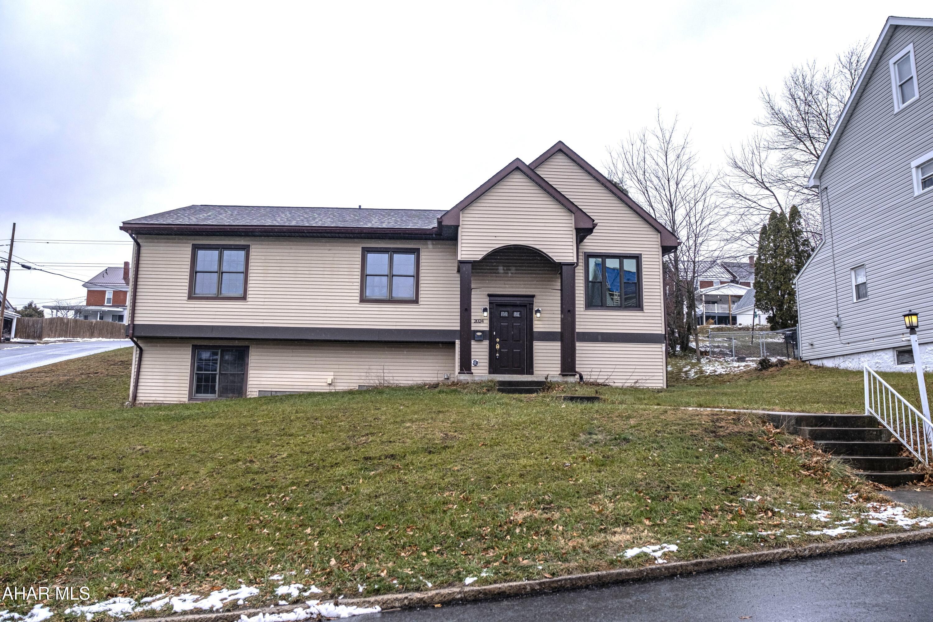 Have you been waiting for a true 4 bedroom move-in ready home? Well look no further! Welcome to 2024 14th Avenue! This beautifully updated split-level home is perfectly situated on a spacious 0.28-acre corner lot! Offering 4 bedrooms, 2 full baths, and a half bath/laundry room, plus a potential 5th bedroom on the lower lever, this home provides comfort, flexibility, and modern style throughout!  Each bedroom offers ample closet space, the living room is complemented by a coat closet, linen/broom closet in the hallway and additional storage shelving in both the garage and utility room, ensuring everything has its place.  Featuring a wide hallway and open-concept main living area that creates an open spacious flow. The kitchen has plenty of cabinets and countertop space, making meal prep and storage a breeze.  The versatile lower-level bonus room offers endless possibilities—perfect as a cozy family room, game room, home theatre, entertainment space, or even a large additional bedroom to suit your needs. 

You'll love the large 2-car integral garage and the extensive list of recent upgrades that make this home truly move-in ready. Exterior improvements include a brand-new roof with a transferable 30-year warranty, a new sliding glass door leading to the brand-new deck—ideal for outdoor dining and entertaining —and fresh exterior paint on parts of the home. The property is also equipped with a sump pump in the garage for added peace of mind. Interior updates feature new carpet and new vinyl flooring throughout, fresh interior paint, new light fixtures and ceiling fans, a new bay window, new floor vents, new hardwired smoke detectors, new toilet seats and a completely new toilet in the primary bedroom. Additional enhancements include new interior door hardware, updated receptacles and light switches.

With thoughtful updates at every turn, generous storage, and abundant space for living and entertaining, this move-in-ready home is prepared to welcome its next owners!