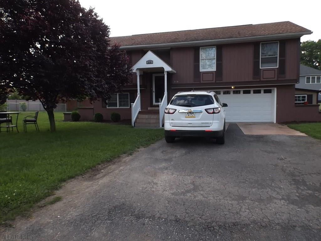 Immaculate split entry in Hollidaysburg.  Large deck off dining area.  Plenty of cupboards and counterspace in the kitchen and includes newer refrigerator, range, and dishwasher.  Master bath and full bath on main level.  Propane fireplace in living room with television above the mantel.  Large family room downstairs along with 3/4 bath and laundry area that includes the washer and dryer.  Entrance to 2 car garage with auto opener.  14 x 8 shed and firepit outside.
