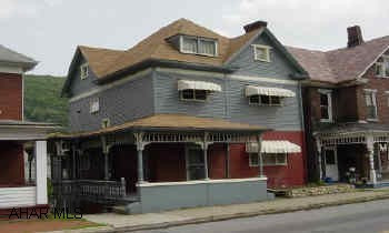 Single family or duplex.  Take flashlight NO electricity.  SOLD "AS IS".