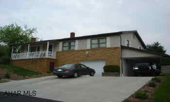 Mint condition, new kitchen, new bathroom, hardwood floors, and beautiful landscaped lot. Garage and carport.