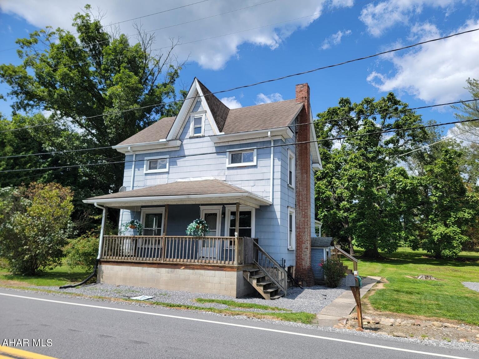 Freshly painted with all new floor coverings. 2 1/2 story, 3 bedroom home situated on 1 acre in Bald Eagle. Oil hot water baseboard heating system. 1st floor laundry. Convenient access to Interstate 99.