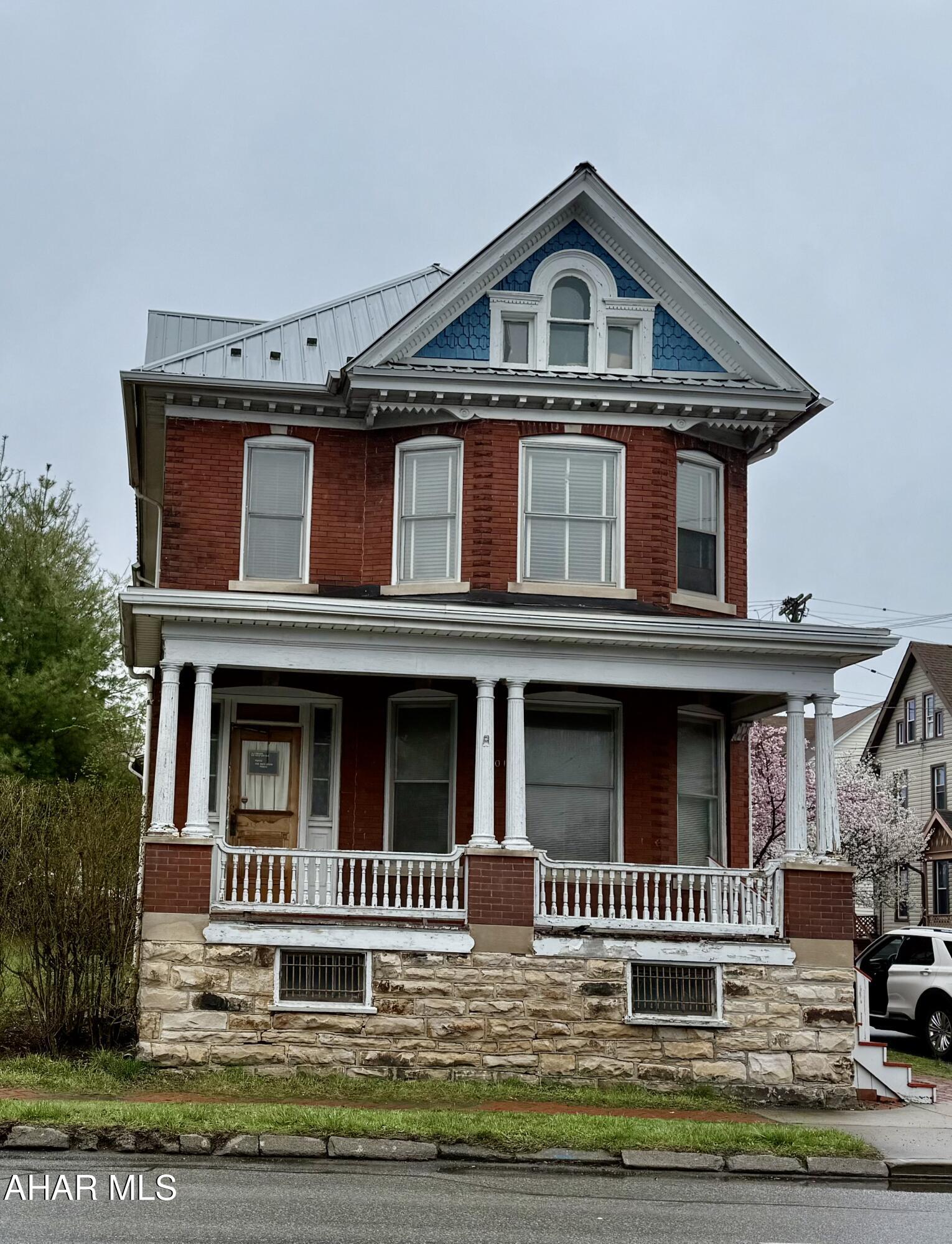 Stately 3 story home in Altoona.  Hardwood Floors have been redone.  New floor in bedroom 2.  1ST floor has  Kitchen with nook, plus dining room and living room,  1/2 bath, and 2nd set of stairs to 2nd floor.  3 large bedrooms , sewing room and full bath on 2nd level.  steps lead to the 3rd level.  The outside makes this home special with brick patio, totally refurbished garage with covered porch.  Yard is fenced. Side yard goes with this property.  Looking for a quick close, this would be it!!