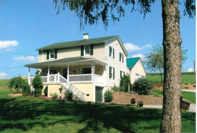 Older farm house completely remodeled. Simply lovely inside and out. Outstanding landscaping, stocked pond, 3-bay 2-story detached garage with heat, electric and water. 2nd detached garage 28x16. Covered front and rear porches. Sits on 3.5 acres surrounded by countryside. This home is move in ready and picture perfect.
