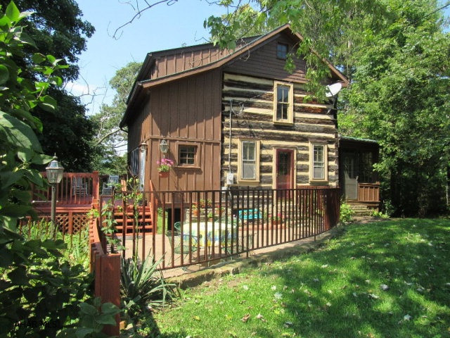Looking for an awesome vacation getaway or a permanent residence?This 2BR,1BA authentic 1700-1800's log home with its wide plank flooring is tucked away in the historic small town of Birmingham,PA near the Grier School.Pack your fishing gear,kayaks,bikes&golf clubs!Imagine being 5 minutes from a Class A Trout River Stream,the Little Juniata River,or biking the Rails to Trails,& enjoying the many other close attractions within 30-45 minutes from your new home.This home offers a large patio for entertaining,a large 24x10'10 deck to sit & view the river, a large enclosed/screened porch,a gas fireplace,a remodeled kitchen & much more!Call for your showing today & experience it all! Conveniently located near Huntingdon,Spruce Creek,Tyrone, & within easy access to I99 to Altoona & State College