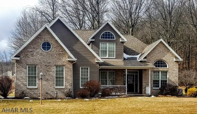 Fox Hollow custom built 4 bedroom, 3.5 bath home with all your favorite updates. Vaulted ceilings, fireplace, first floor master suite with vaulted ceilings, stainless steel appliances, granite countertops, hard wood floors and an open kitchen. Finished lower level and tons of storage, new private deck with wooded views, all on a flat, corner lot.
