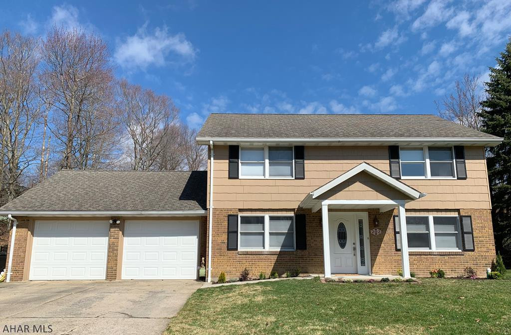 Updated 3 bedroom, 3 bath home in coveted Crestwood neighborhood. Brand new garage doors enhance the curb appeal! Inside, you find new hardwood floors, radiant heat tile flooring in the kitchen/dining room and freshly painted walls. The kitchen features stainless appliances, soft close cabinets and access to the backyard patio. There is also a large, newly fenced in yard (maintenance free fencing) and a shed w/electricity. Upstairs you find the spacious master suite with ensuite bath, WIC, double sinks & tile shower. Plus, two more bedrooms + a full bath, a heated 2 car garage, half bath, newly remodeled laundry room,  a new HVAC system with air purifier & two large attic areas, providing an abundance of storage space! Updated landscaping!