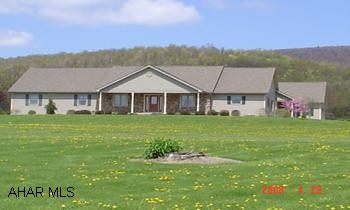 Beautiful, spacious ranch 4BR 2BA 2 car garage on 7.3 acres. Built in 2001 Business and home could be sold as 1 package. Call Kim at 814-934-7158 for details shared well & septic with business.