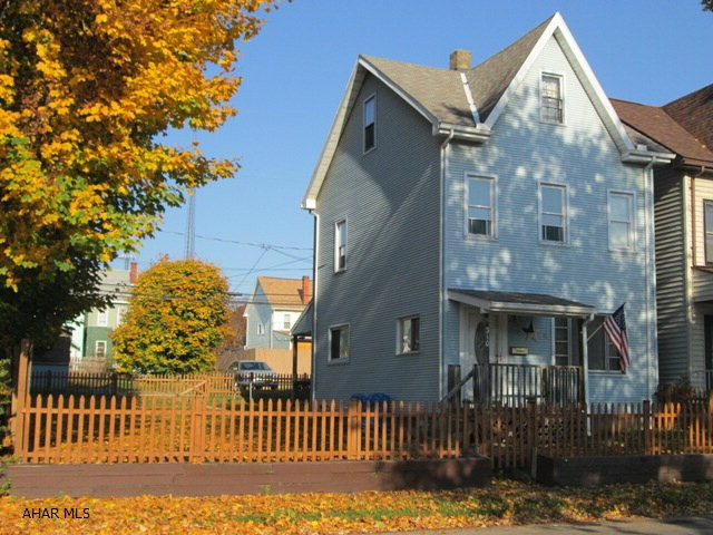 East End. Family owned for over 50 years displays the pride of ownership. This all vinyl exterior offers new thermopane windows on a large fenced lot. The interior boasts newer eat-in kitchen & updated bath. All appliances included and the third floor bedroom suite is included in the sale. Tankless hot water system and C/A. Off street parking for three cars.