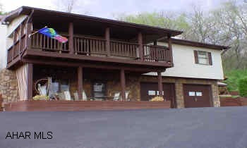 SECLUDED RANCHER WITH BEAUTIFUL VIEW. 3 BEDROOMS, 3 BATHS, 3-CAR GARAGE, WET BAR, FAMILY RM WITH FIREPLACE, GREAT ROOM, AND WORKOUT ROOM.  LOCATED IN ROLLING HILLS. TEL POWER ROAD, 6TH HOUSE ON LEFT.
