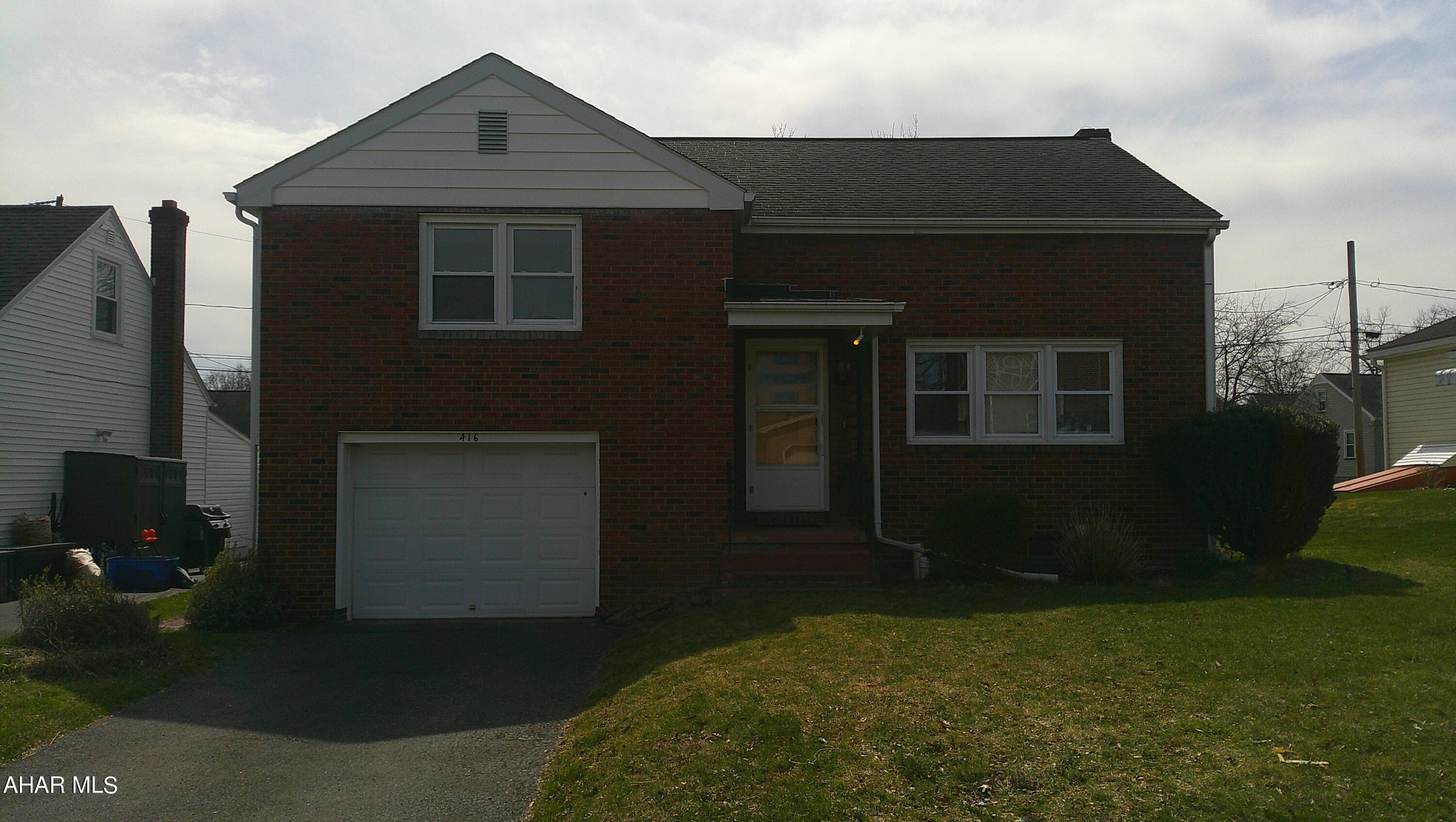 A perfect opportunity to purchase a well built home in a sought after neighborhood!  This home is located on a lovely, quiet street of well kept homes and at the end of the street is the high school and junior high!  Imagine not having to transport the kids to their after school activities.  Walk them to the end of the street, and they are there!  This home is a five level split!  The main level includes the living room, dining area and kitchen.  Up one level and you have two generous bedrooms with super size closets and a full bath.  Up to the second upper level and the primary bedroom with tons of closet space and all the nooks and crannies which are normally reserved for a cape cod!  In utilizing some of the ample closet space, I see the perfect opportunity to add a luxury primary bath and create your own lavish sanctuary.  From the kitchen you take a few steps down to the oversized one car garage with space for a workbench or craft area and access from the rear to the backyard.  One more level down to a huge room which houses the boiler and laundry area but allows plenty of space for a family or recreation room.  This home needs your finishing touch, some updates and it can be the perfect home to grow your family for years to come.  A short walk to the historic district and diamond area.