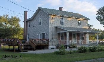 2 story 3 BR vinyl sided home on approx  acre lot. New kitchen, 1 car detached garage, large wood deck. Priced to sell at $99,9002 story 3 BR vinyl sided home on approx  acre lot. New kitchen, 1 car detached garage, large wood deck. Priced to sell. 2 story 3 BR vinyl sided home on approx  acre lot. New kitchen, 1 car detached garage, large wood deck. Priced to sell at $99,900