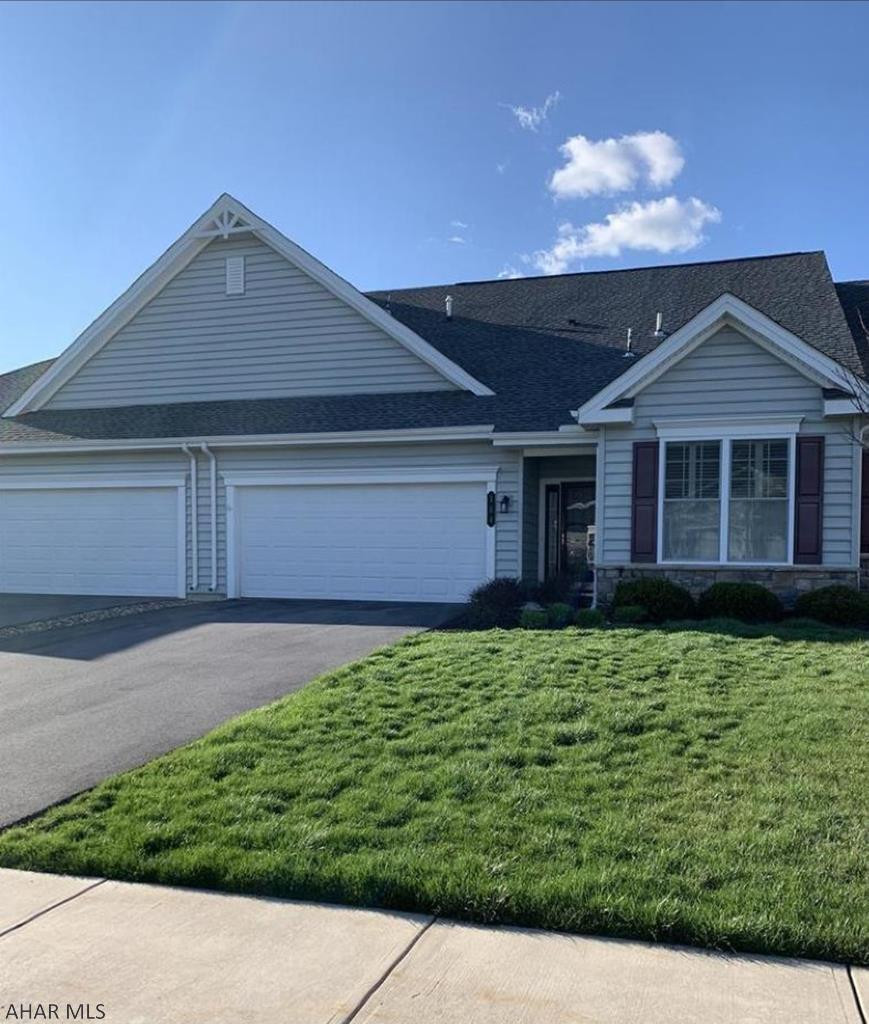 2-story Condo.  HOA Fees $325/month - includes exterior maintenance, clubhouse, lawn care, snow removal & trash