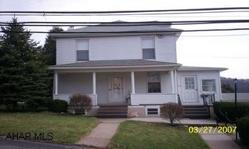 2 Story, 3 Bedroom, 1.25 Baths, Screened Porch, Kitchen, Formal DR, Formal LR, Full Basement unfinished. Very clean.  2 Story with 2 Stall attached garage, off street parking, on a 122'x50' lot.  Thermopane windows, aluminum siding, gas FHA with central air.  Comes with Refrigerator, Range, Washer & Dryer.  100 amp breakers.  2 Out Buildings, 4 ceiling fans, updated kitchen & baths.