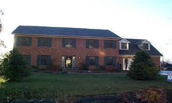 Spacious 5 BR home, oak trim, hardwood, tile, fin. bsmt., walkout, wet bar, util garage, large deck & covered patio.   Wooded, 3/4 acre corner lot.  See interior photos at www.CarolGardiner.com Spacious 5 BR home, oak trim, hardwood, tile, fin. bsmt., walkout, wet bar, util garage, large deck & covered patio.  Wooded, 3/4 acre corner lot.  See interior photos at www.CarolGardiner.com.