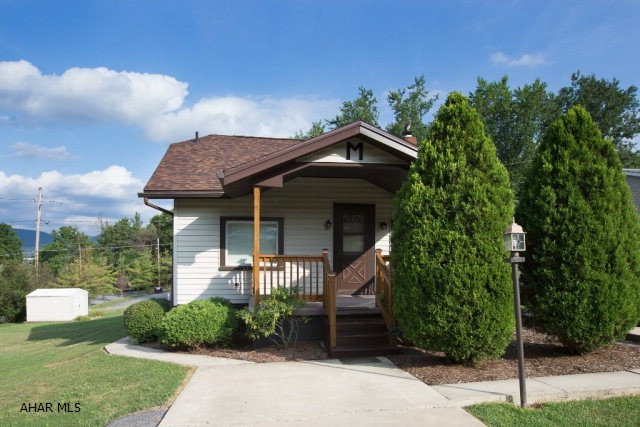 Single floor living with a large yard, privacy, and a wonderful view!  Do not let this 3 bedroom home pass you by! Over a 1/4 acre lot in the city.  Enjoy a peaceful evening on the partially covered rear deck, or simply relax after a long day on the front porch.  Energy efficient windows and a well maintained house are waiting for you to add your touches and call it home. Vinyl siding provides a maintenance free exterior, and the roof was installed in 2015. As the temperatures heat up, let the central air cool you down.  Off-street parking for multiple vehicles.  Call the listing agent for your private showing today!