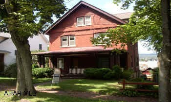 2-1/2 STORY WITH DECORATIVE BRICK, FRONT GABLED ROOF, DORMERS, COMPLETELY RESTORED. MANSION ROW PERIOD  UNIQUE HOME ON UNIQUE STREET.  STEP BACK TO THE TIME OF SOME OF THE MOST IMPRESSIVE HOMES IN ALTOONA WITH ALL OF THE MODERN FEATURES.  HIGH CEILINGS, BEAUTIFUL WOODWORK, MASTER BEDROOM WITH SEPARATE SITTING ROOM.  3 BEDROOMS, 2-1/2 BATHS, 2 CAR GARAGE, LARGE DECK, SOME FENCING.  FINISHED BASEMENT. NEW TILE FLOOR IN KITCHEN, GAS FIREPLACE.  SEE MIKE McCAULLEY 944-2117.