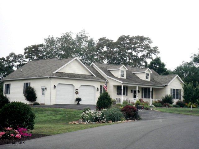 2003 CUSTOM-BUILT HOME BY WALTMAN. HANDICAP-ACCESS. HALL & INT.DOORWAYS.  Andersen DP wind's.;HP/CA/Prop.gas backup syst.-new 4/2013. Beautiful HW & CT floors, 9'ceil's.,oak cab's & trim; seal/heat.2-bay garage. Nice-finish base.w/ lg. rec room, lg.family rm w/ wd. pellet stove & wind's for good natural light, 3/4 bath, foyer/den area, util.rm./wkshop w/dbl.ext.doors. Lovely master BR suite w/ private bath, W-I closet & bay window. Main level laundry. Radon system. Home wired for generator. Kinetico water cond. 2 Water heaters (1 almost new/other just had 2 heat elements replaced).Ft. porch, base.patio + delightful screen-in back porch. Frig in garage stays. Square feet is approximate.    I AM GORGEOUS INSIDE!!     $10,000.00 REDUCTION! PRICED TO SELL @ $284,900.00!