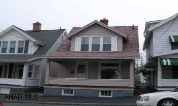 2 STORY ALUM. SIDED WITH 1 CAR DETACHED GARAGE. BEAUTIFULLY REMODELED HOME IN EAST END.  LOVELY OAK KITCHEN AND BATH WITH SHOWER.  ALL NEW FLOORING, NEW WINDOWS, 2 YEAR OLD ROOF.  GAS FIREPLACE WITH NO LOGS.  FRENCH DOORS TO DINING ROOM WITH PERGO FLOOR.  NEW HOT WATER TANK.  PAINTED THROUGHOUT.  MOVE IN!  IT'S SUPER.