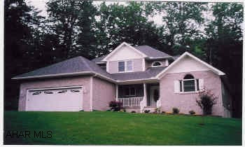 Nearly new contemporary home in premier development.