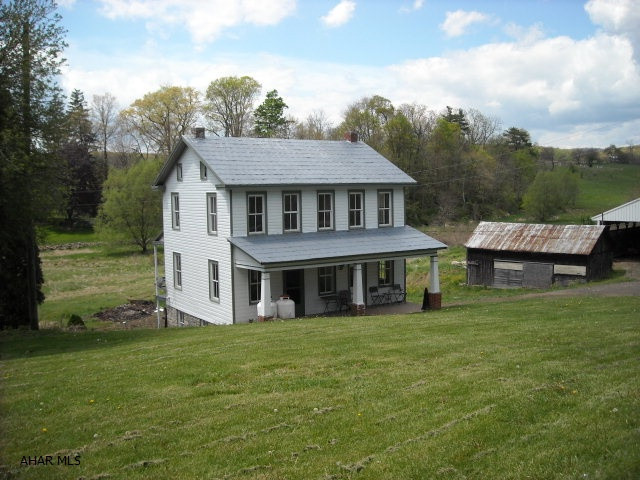 Fisherman's Paradise! Located on approx 1/4 mile of Class A Wild Brown Trout stream. Includes large barn and other outbuildings. Located on quiet country road. Ideal for weekend getaway or full time residence.