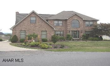 BUILDER OWNED-CUSTOM BUILT 2.5 STORY W/ OAK EAT IN KIT., FAMILY ROOM W/ VAULTED CEILINGS AND GAS FP.  HARDWOOD AND CERAMIC TILE THROUGHOUT AND SUNROOM W/ HEAT AND C/A LEADS OUT TO IPE DECK. BASEMENT W/ OAK WET BAR, 3/4 BATH AND MASONARY FIREPLACE.