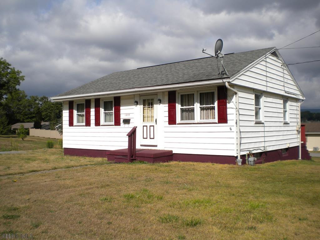 One story home  on a large, flat corner lot in Pleasant Valley. Off street paved parking. 2 bedroom, 1 bath with hardwood floors. Full basement with outside entrance. Newer roof, furnace & hot water tank. House is situated on a 60x120 parcel and there is a 60x120 additional adjoining parcel included in the sale. Lots of space for a garden! Cal me today for your personal tour of this home.