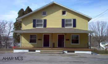 Property is double home.  Each side has two bedrooms, living room, eat-in kitchen, and one bath.  Property has new carpet and has been freshly painted. Property is double home.  Each side has two bedrooms, living room, eat-in kitchen, and one bath.  Property has new carpet and has been freshly painted.