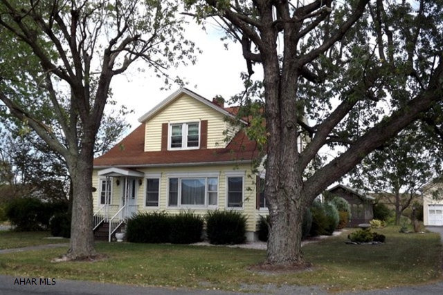 Large country home w/ 2137 sq ft! Recently remodeled thru-out. L-shaped 0.899 lot w/ 2 car detached garage. Truly move-in condition, newer flooring, paint, windows, insulation, furnace and storm doors. Blueberry, apple, pear and English walnut trees also.