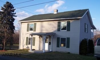 remodeled vinyl sided two story 3 bedroom  house with large yard on corner lot and shed. 3 bedroom house remodeled with new roof, new appliances including first floor laundry with washer and dryer, new fixtures, new carpet, laminate flooring, and spouting, blown in insulation, two story porch, anderson windows, full unfinished basement.