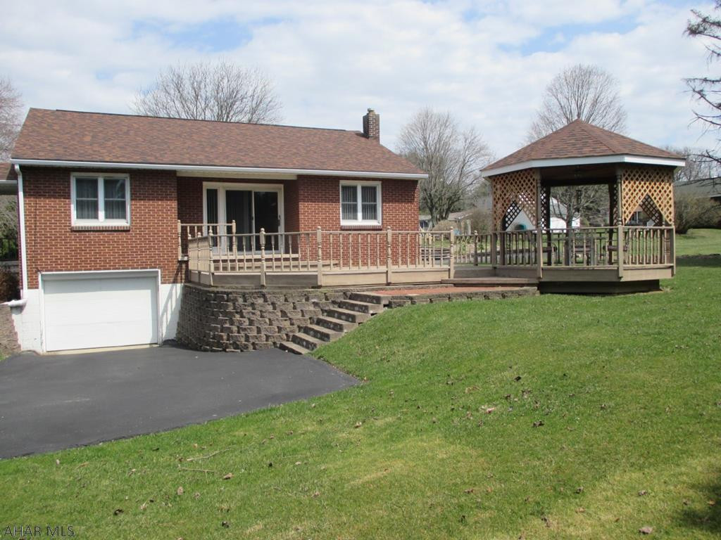 This 2 BR brick home sits on 2 lots and is located in a quiet neighborhood with in 1 mile of downtown Indiana. It has a large kitchen and updated bathroom. The finished carpeted basement has builtin cabinets with counter tops. It is handi-cap accessible with a lift chair that can be removed. the attached deck with gazebo is excellent for outdoor gatherings.