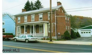 Property contains 2 buildings. Main house is currently vacant, could be used as rental or converted back into a single family dwelling. Back house has 2 apartments, both currently rented. Large back yard with off-street parking. Main house room sizes below. Rooms for 2nd house (319 W. Pitt)  are 1st floor - Living Room 15x17, Kitchen 10x15, Bedroom 11x13, Bedroom 11x11 and full bath. 2nd floor - Living Room 13x16, Kitchen 12x14, Bedroom 10x16, Bedroom 12x14 and full bath. Oil hot water heat.