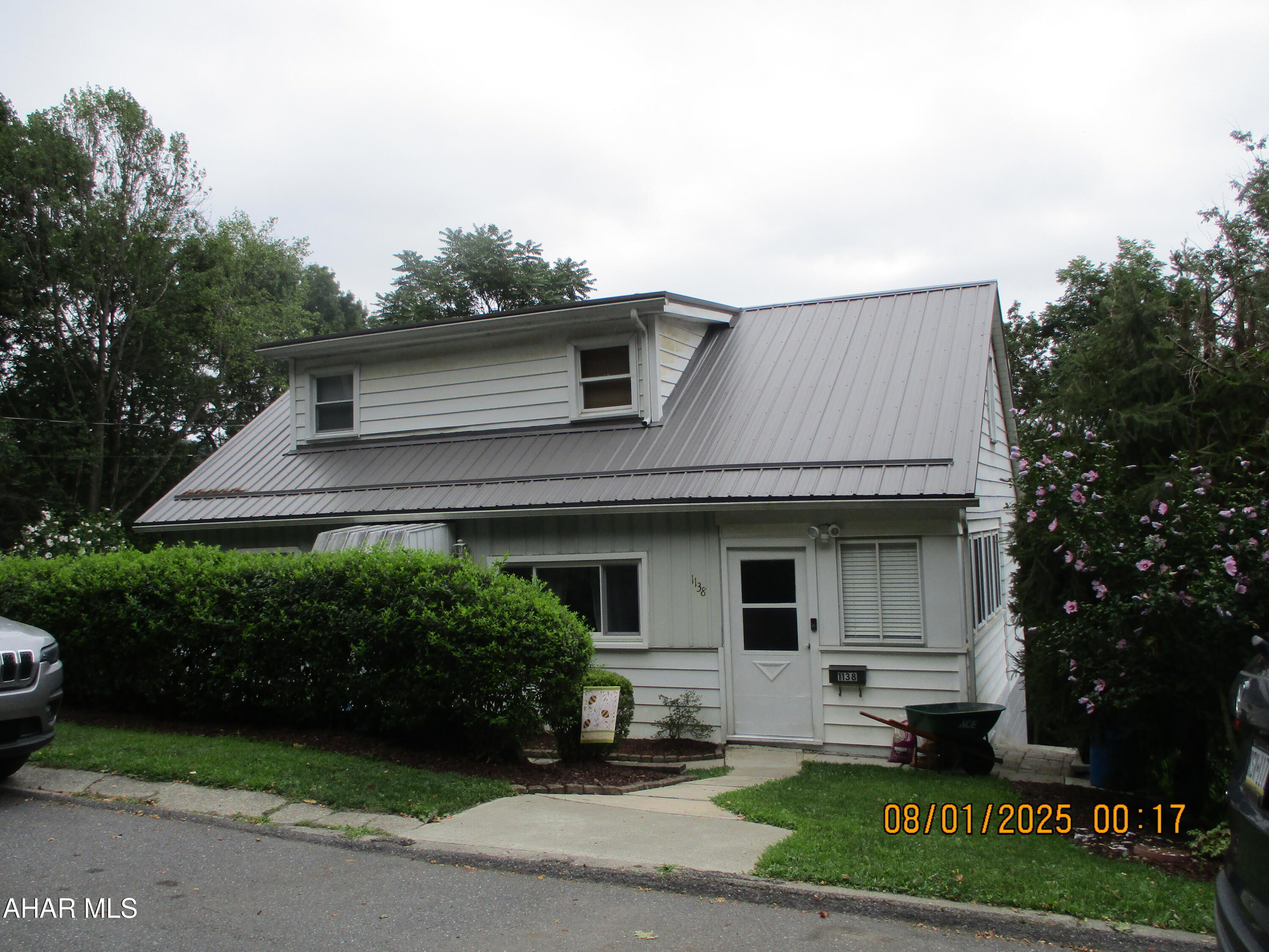 Check out this charming Cape Cod on a dead end street.  Many updates including newer windows, new front door, steel roof, central A/C. on first floor. Partially finished basement with on-grade walk out feature.  Terraced yard in rear.   Key code for all doors.
