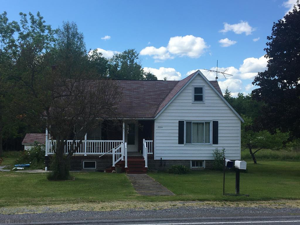 Charming 3 BDRM home on 1.6 acres with gazebo & fruit trees. Surrounded by 25.5 wooded acres with a stream crossing the property.