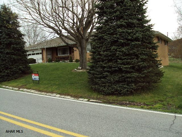 Very nice 2 bedroom ranch on large lot with heated workshop. Possibility of converting home to 3 bedrooms if needed. Newer wall oven, stove top and microwave. Roof is 4 years old. Exterior painted in fall of 2011. Well maintained, new maintanence free front and rear porches. Hollidaysburg Schools.