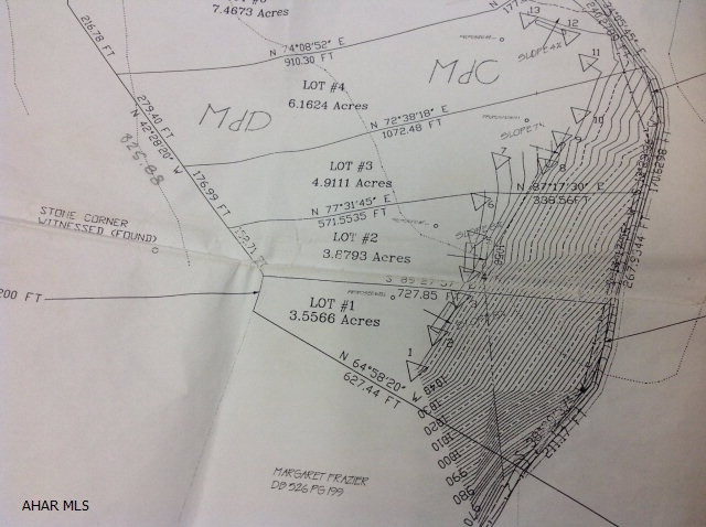 Nice wooded building lot with a view! Year around residence or a great location to build your cabin in the mountains!! Perc approved for a sand mound septic system. Lot 1 next to this lot is For Sale and has 3.5566 acres and is also perc for sand mound septic system.  Very nice views from either property.