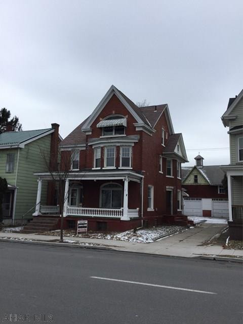 Beautiful original wood work, hardwood floors, huge rooms, newer windows.