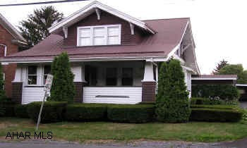 Up-dated 1.5 story, vinyl/wood shingle design, 3BR/2BA in move-in condition. Features include a guest house. All thermopane windows, new furnace, custom built kitchen, main level laundry, huge family room, partially finished basement, sunroom, security system. Attic is floored for storage