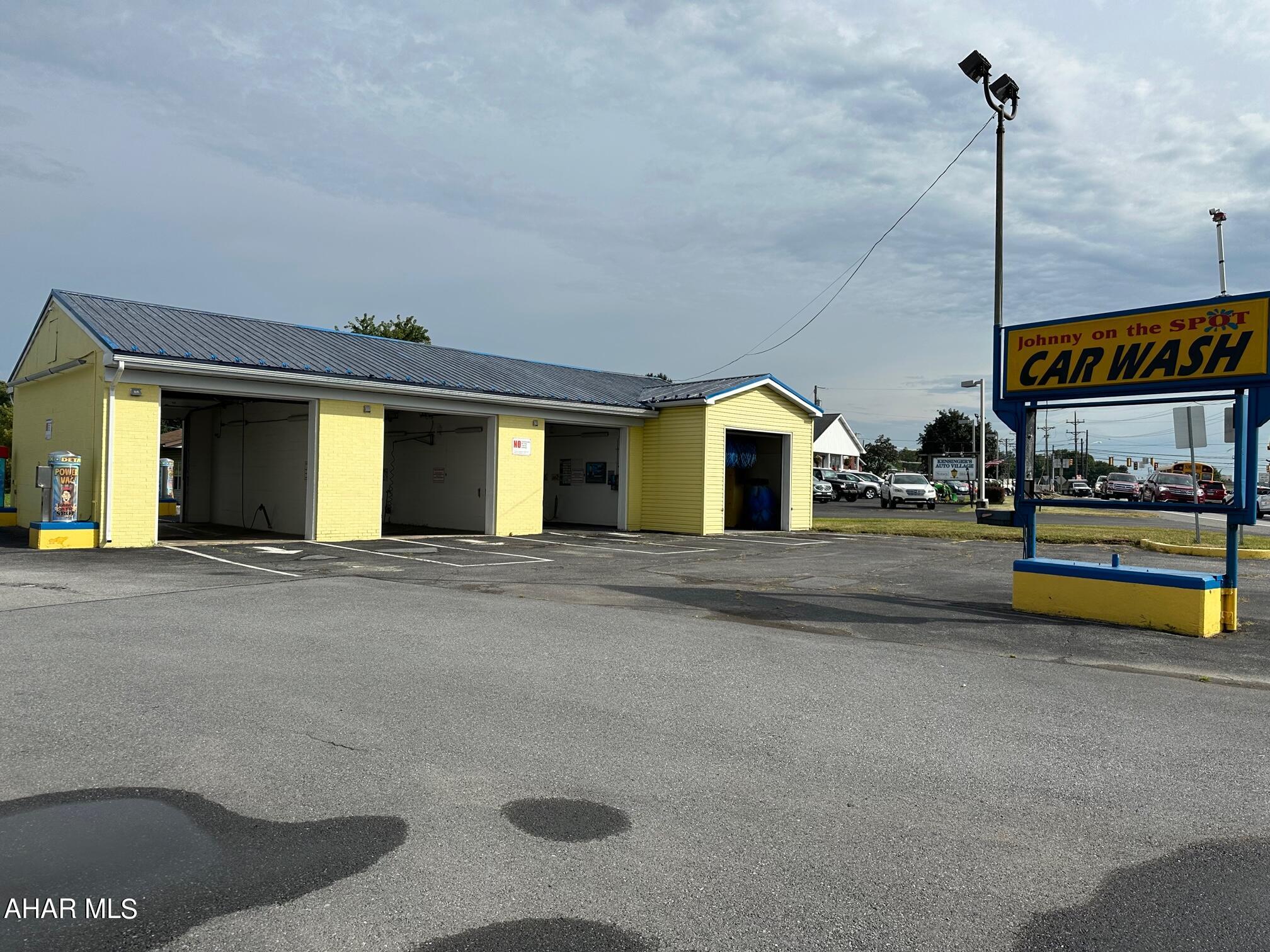 Roaring Spring Car Wash along Rt 36.  Three self-serve bays and one automatic bay.   Property includes rear garages and office.