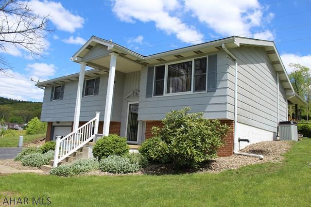 3 bedroom, 2 bathroom home in Hollidaysburg School District. This home has 2 bathrooms completely remodeled (1 w a cedar closet) dining room w/ hardwood floors that opens out to a beautiful covered deck, nice size bedrooms, family room w/ pellet stove for chilly winter (and May) days and wet bar, fire pit and a place all ready for a garden. The yard has fruit trees, blueberry bushes and grapevines. This home sit on over half an acre on a quiet street. Contact me for more information.